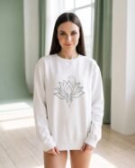 Elena, the stretching.shop AI guide, with the Lotus Line Sweatshirt