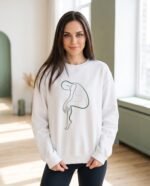 Elena, the stretching.shop AI guide, with the One Line Stretch Sweatshirt