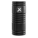 TriggerPoint GRID 1.0 foam roller in black, angled view of the ridged and flat surface zones