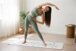 Elena, the stretching.shop AI guide, with the Crescent Rows Yoga Mat