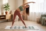 Elena, the stretching.shop AI guide, with the Dune Ripples Yoga Mat