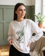 Elena, the stretching.shop AI guide, with the Reaching Hare Sweatshirt