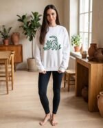 Elena, the stretching.shop AI guide, with the Stretching Cat Sweatshirt