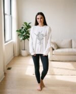 Elena, the stretching.shop AI guide, with the Wildflower Bunch Sweatshirt